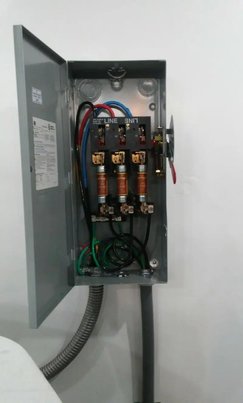 Three-phase disconnect switch installed for Smoke Detector Installation in Belvedere
